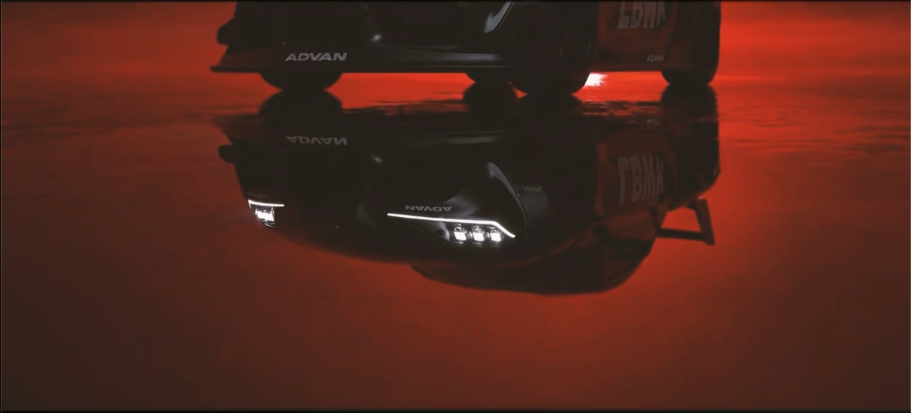 Selected dynamic output showing the model car reflected in a red-lit floor